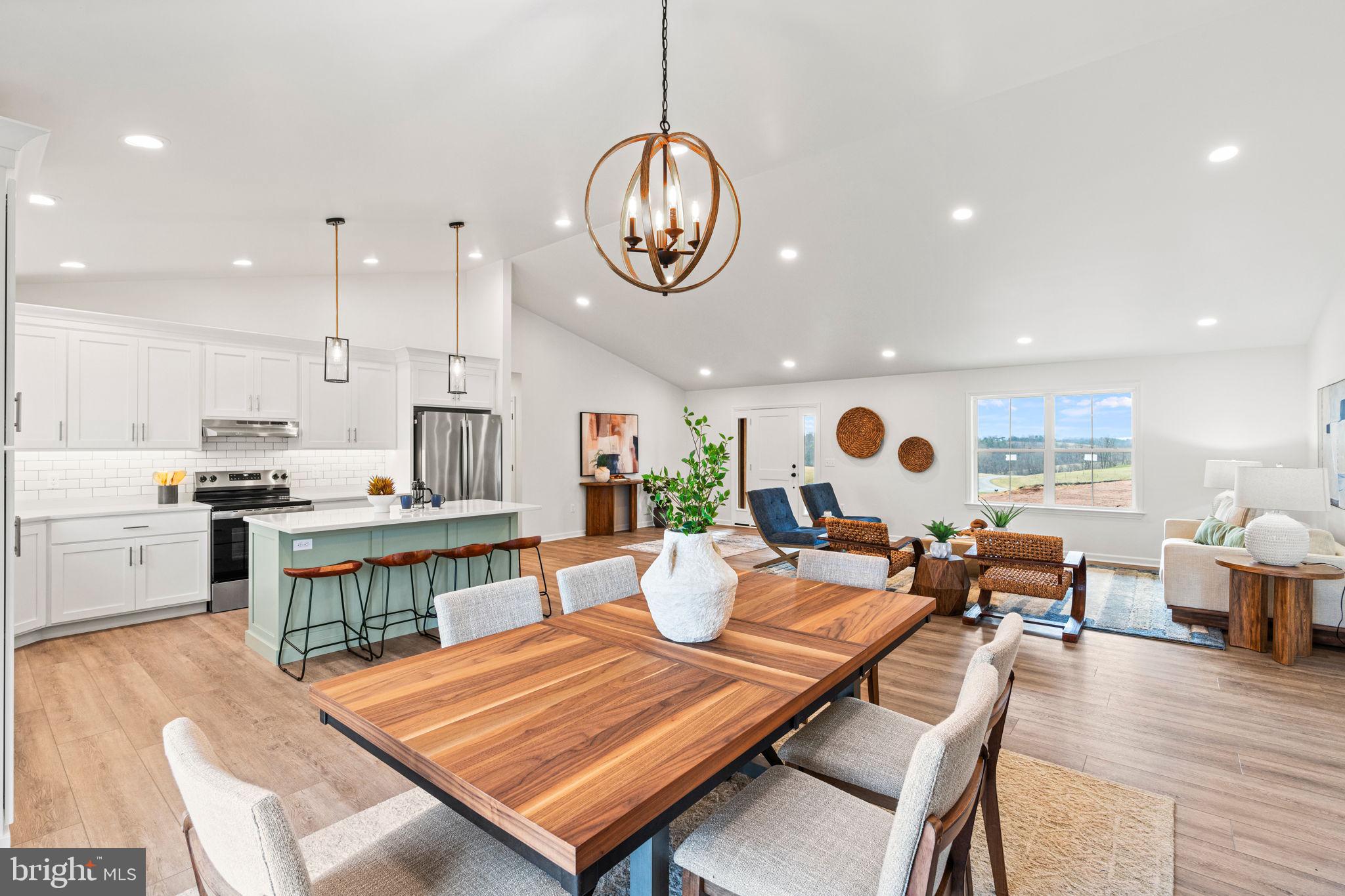 239 Brookview Drive Newport, PA 17074 - Photo 16 of 42 a living room with lots of furniture and kitchen view