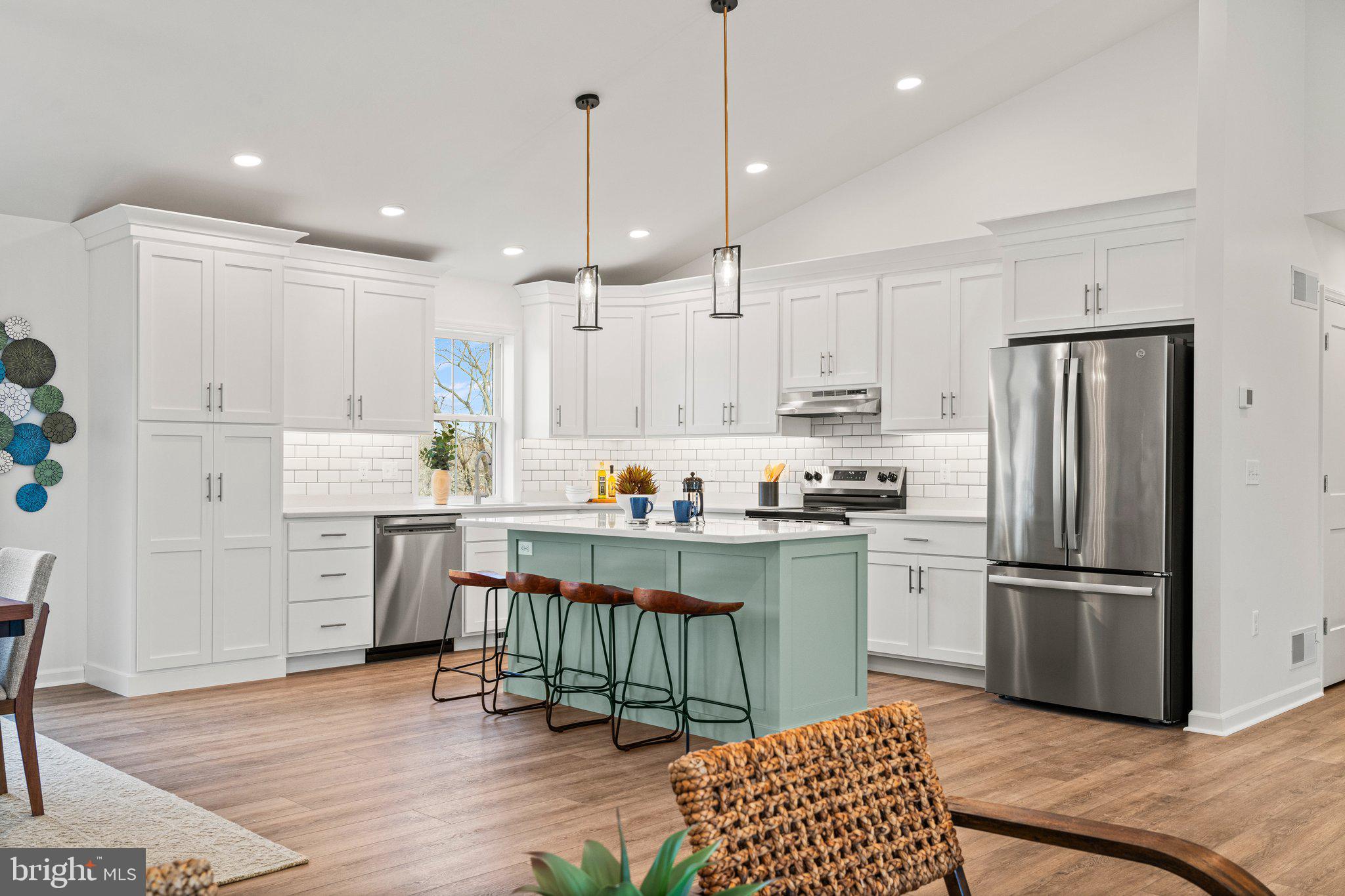 239 Brookview Drive Newport, PA 17074 - Photo 6 of 42 a kitchen with white cabinets and stainless steel appliances