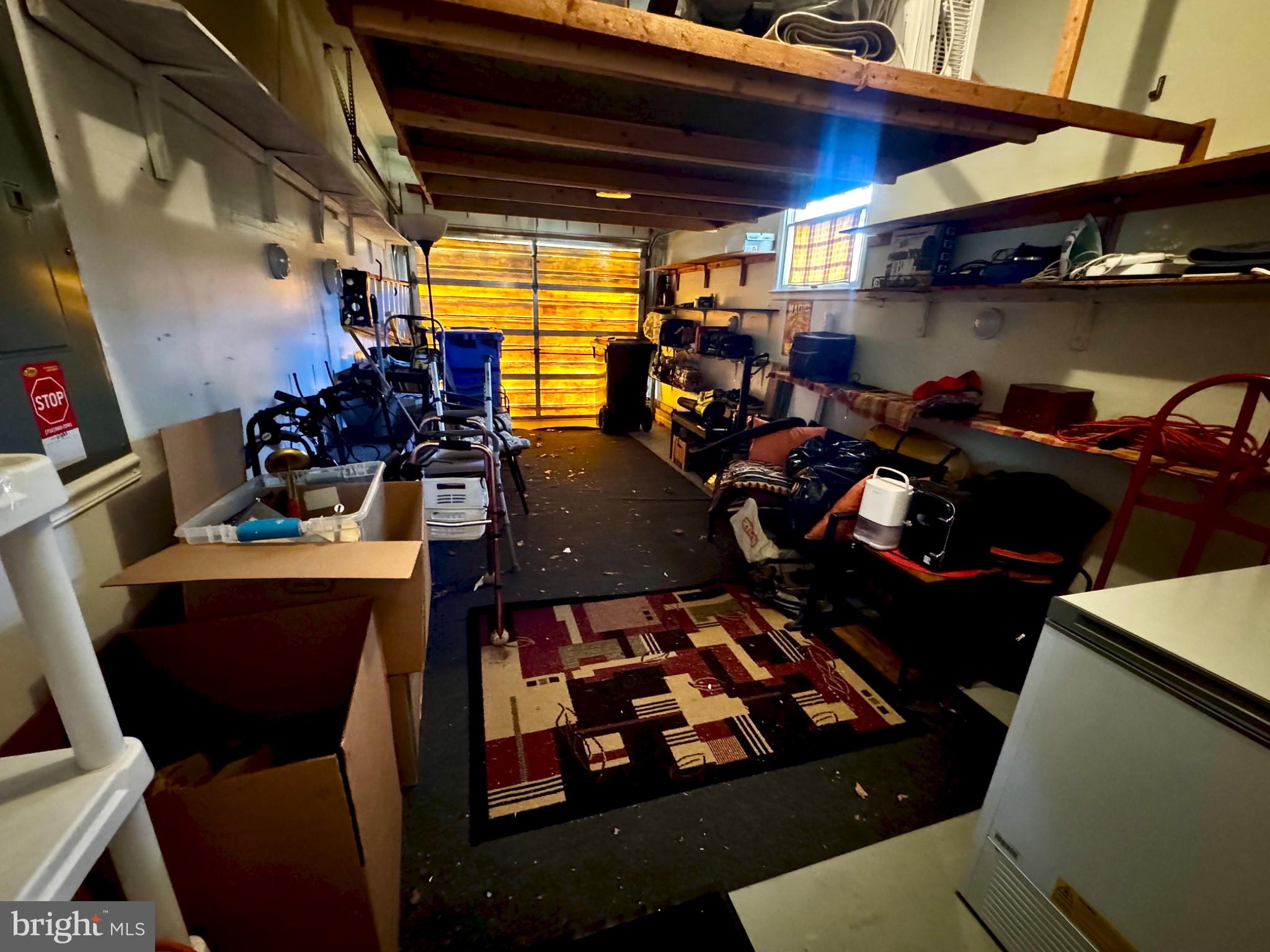 4 Dogwood Road, Unit 29 Manahawkin, NJ 08050 - Photo 27 of 31 Spacious garage with organized storage.