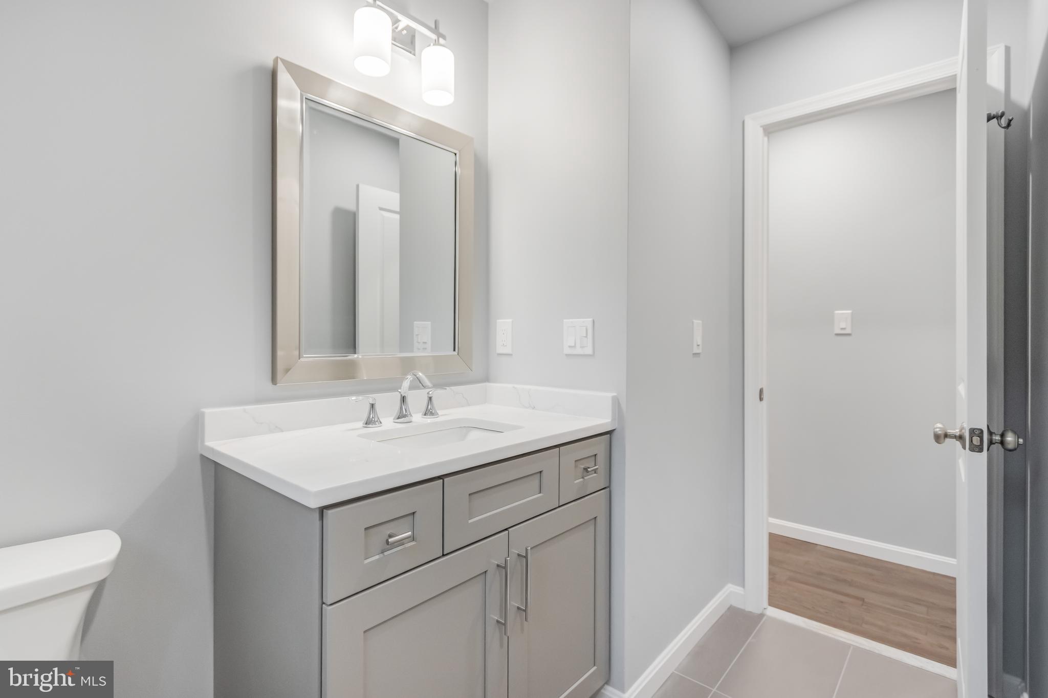 4010 Oaklawn Road Fort Washington, MD 20744 - Photo 20 of 37 a bathroom with a sink and a toilet