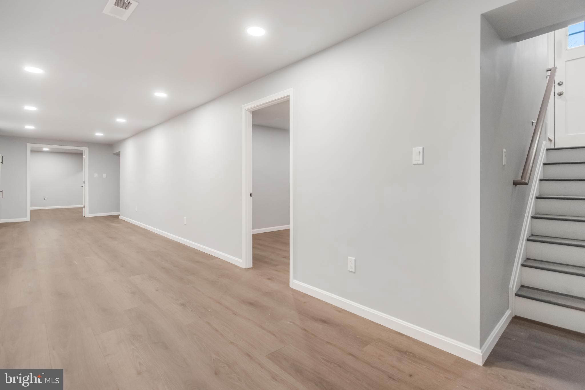 4010 Oaklawn Road Fort Washington, MD 20744 - Photo 22 of 37 a view of an empty room with wooden floor