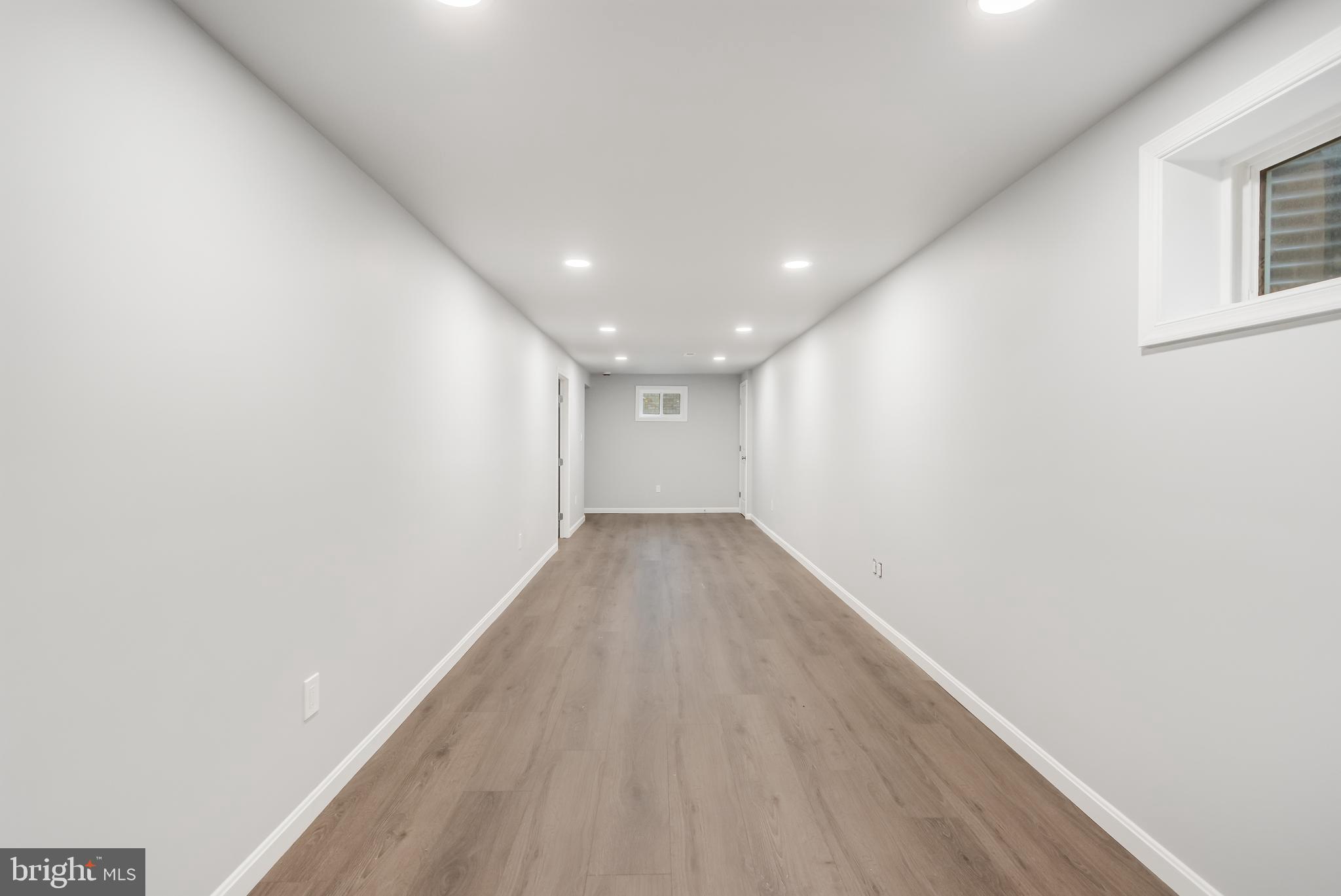 4010 Oaklawn Road Fort Washington, MD 20744 - Photo 25 of 37 a view of a big room with wooden floor and entryway