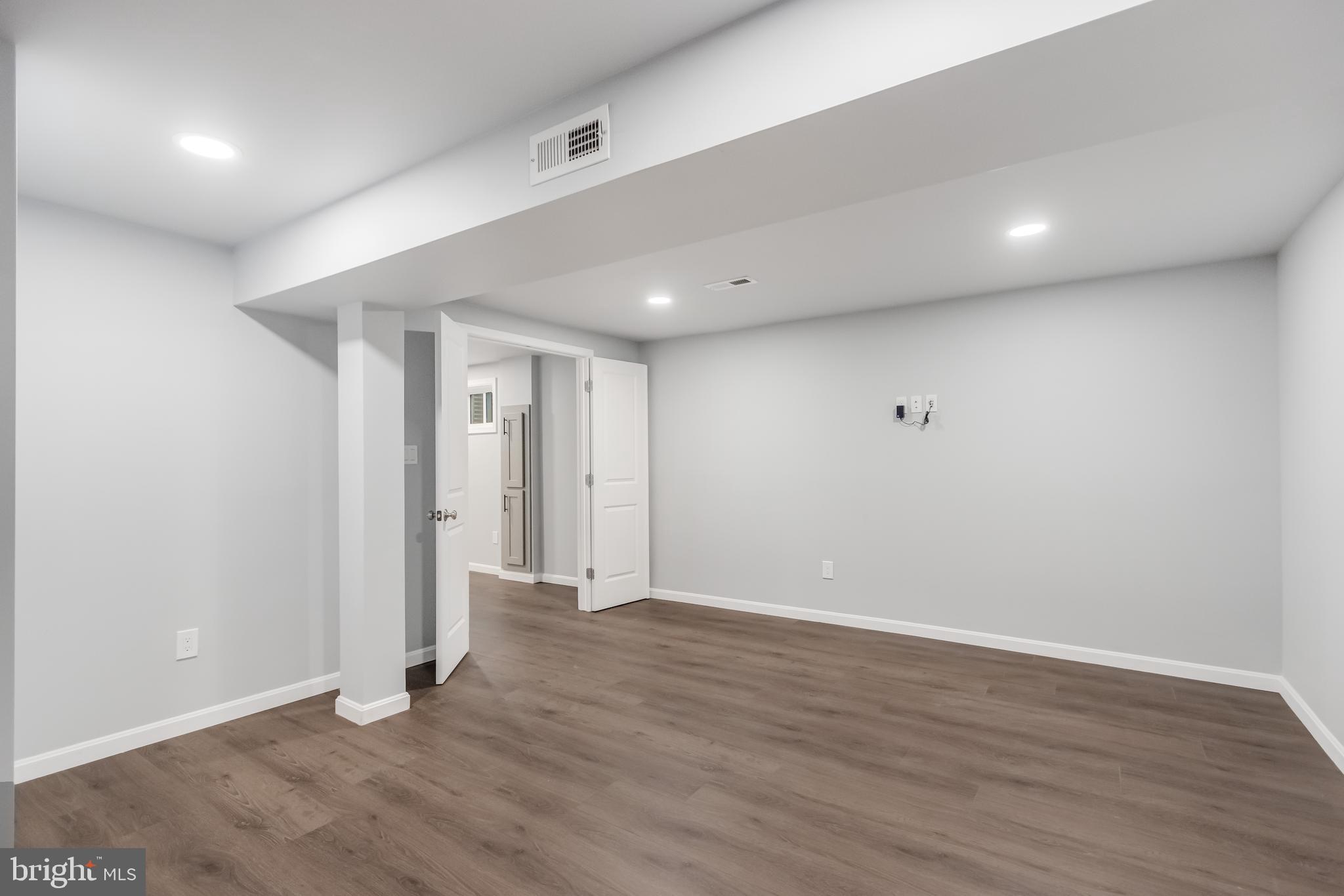 4010 Oaklawn Road Fort Washington, MD 20744 - Photo 33 of 37 a view of an empty room with wooden floor