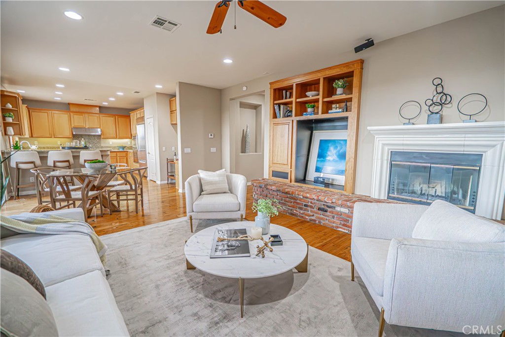 28419 Hidden Hills Drive Saugus, CA 91390 - Photo 11 of 60 a living room with furniture and a fireplace