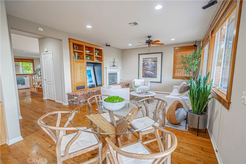 28419 Hidden Hills Drive Saugus, CA 91390 - Photo 14 of 60 a view of a dining room with furniture window and wooden floor