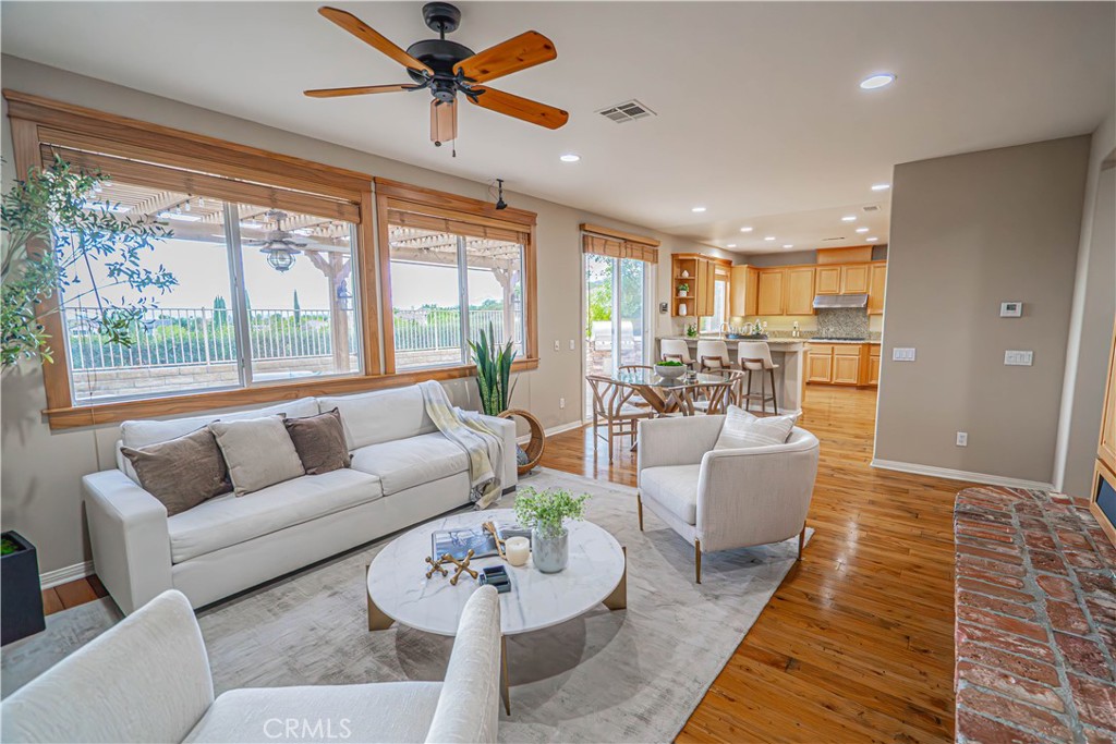 28419 Hidden Hills Drive Saugus, CA 91390 - Photo 21 of 60 a living room with furniture and a large window