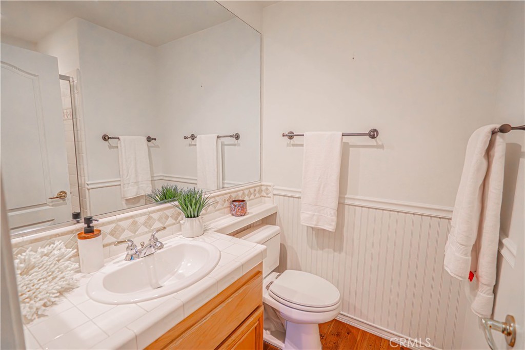 28419 Hidden Hills Drive Saugus, CA 91390 - Photo 25 of 60 a bathroom with a sink toilet and shower