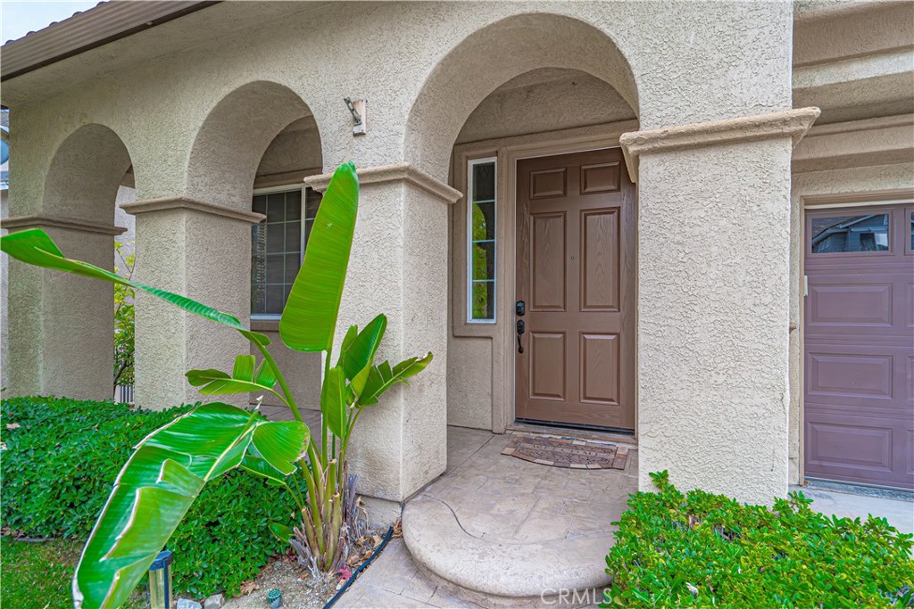 28419 Hidden Hills Drive Saugus, CA 91390 - Photo 3 of 60 a house view with a garden space