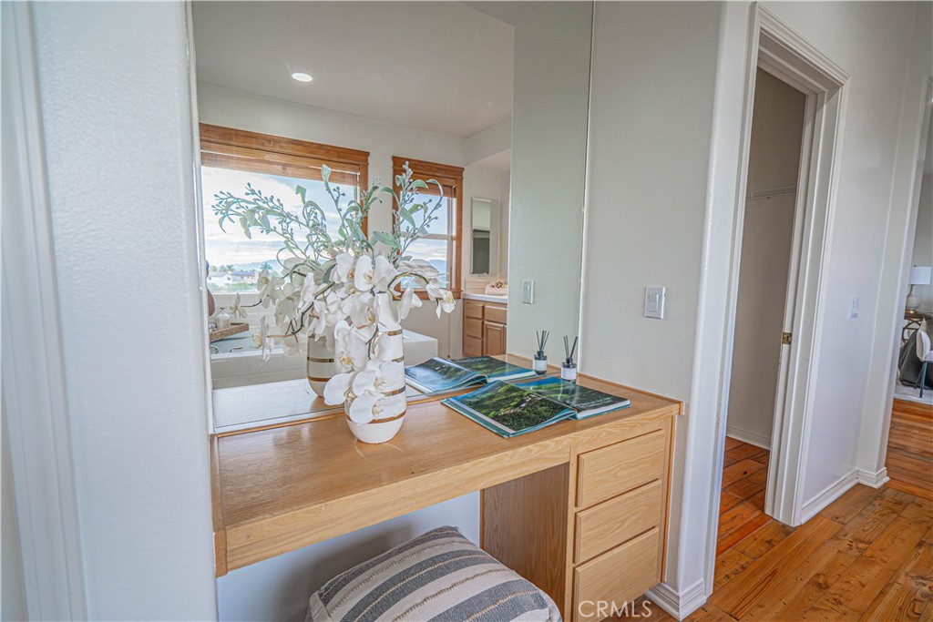 28419 Hidden Hills Drive Saugus, CA 91390 - Photo 41 of 60 a view of kitchen island with furniture and wooden floor