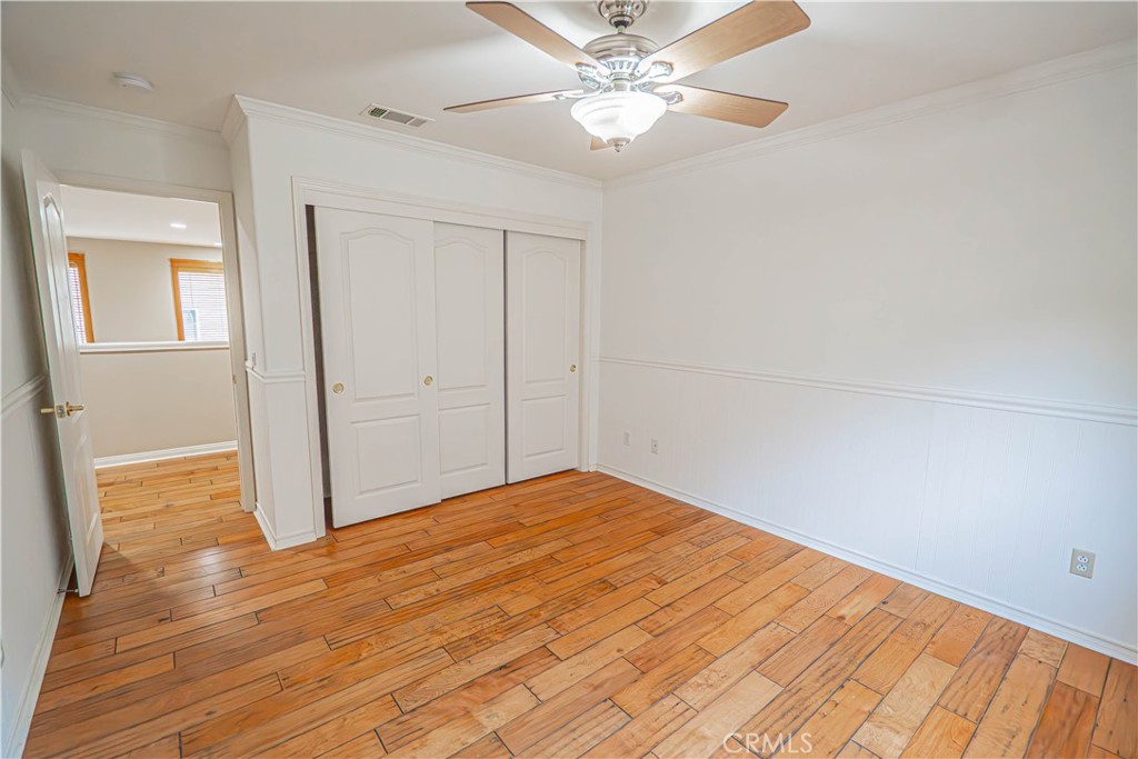 28419 Hidden Hills Drive Saugus, CA 91390 - Photo 46 of 60 a view of empty room with wooden floor