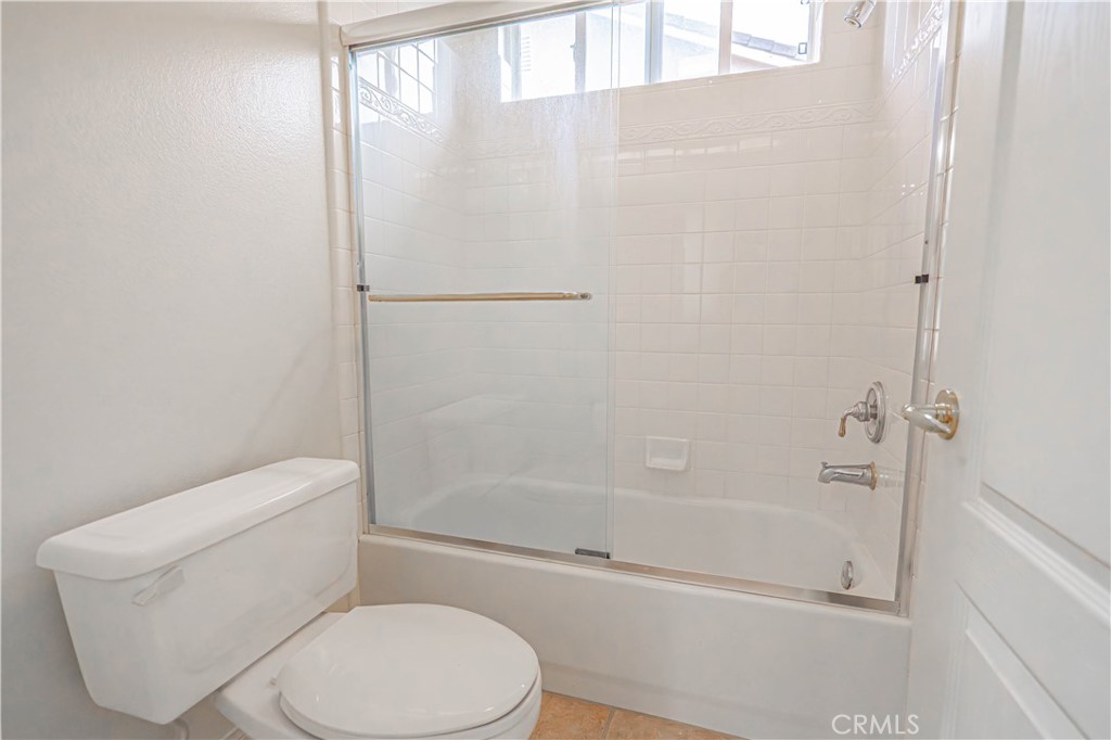 28419 Hidden Hills Drive Saugus, CA 91390 - Photo 51 of 60 a white toilet sitting next to a bath tub