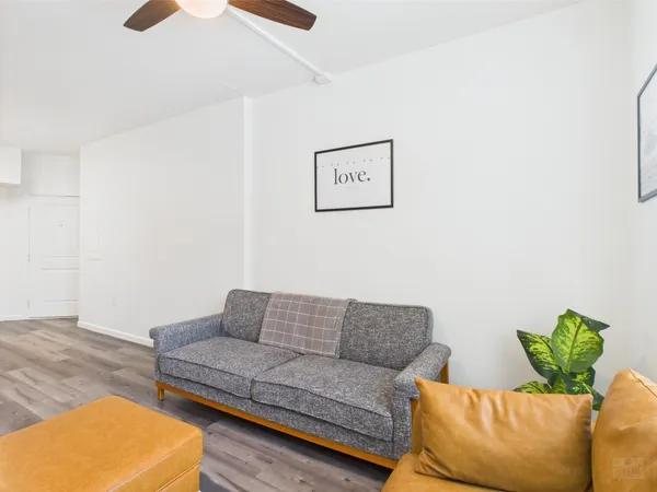 a living room with furniture and a couch