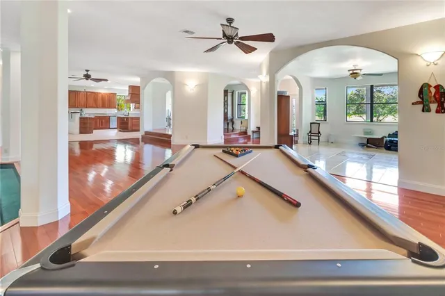 a view of a living room and bathroom