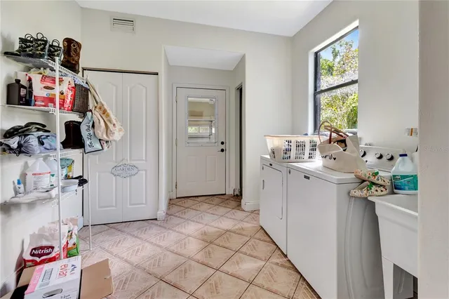 a room that has a bed and a window in it