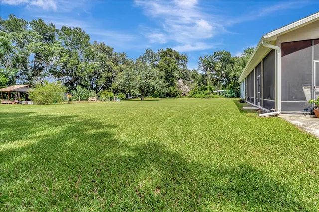 a view of a backyard with a garden
