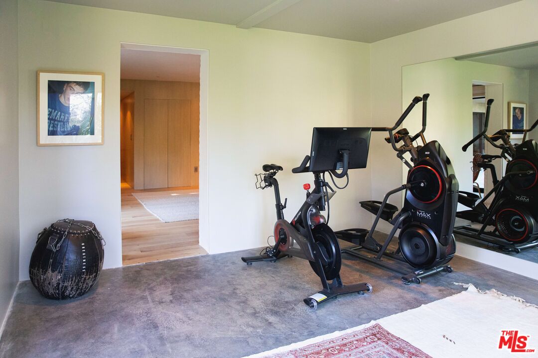 226 South Rimpau Boulevard Los Angeles, CA 90004 - Photo 27 of 43 a view of a room with gym equipment