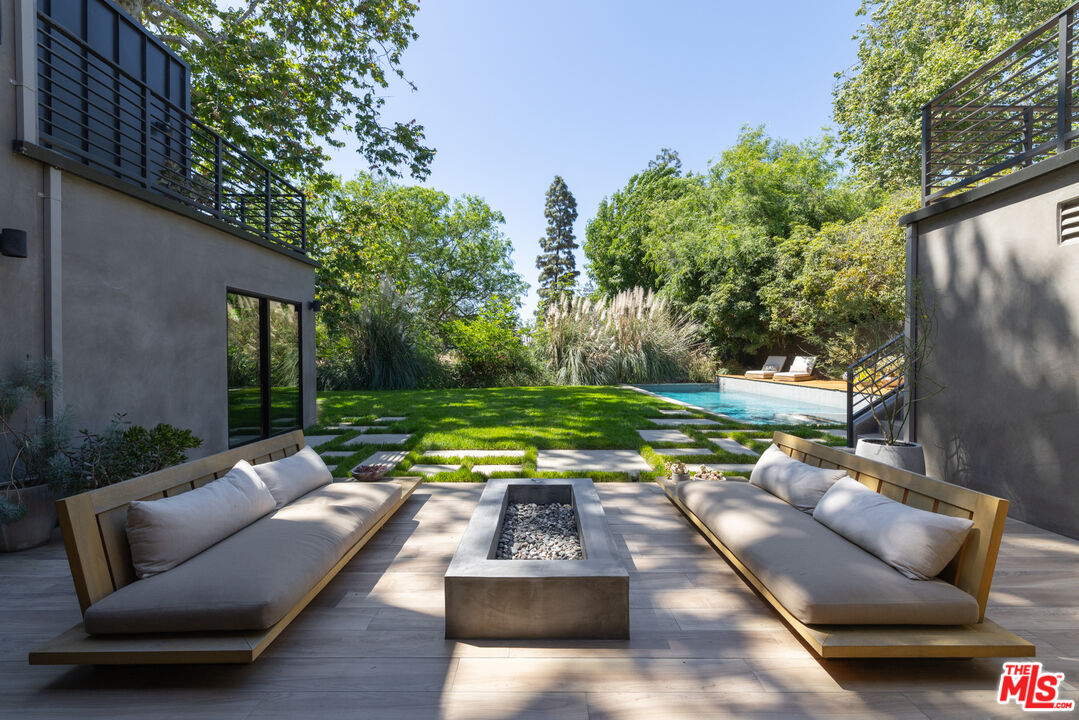 226 South Rimpau Boulevard Los Angeles, CA 90004 - Photo 36 of 43 a view of a yard with furniture