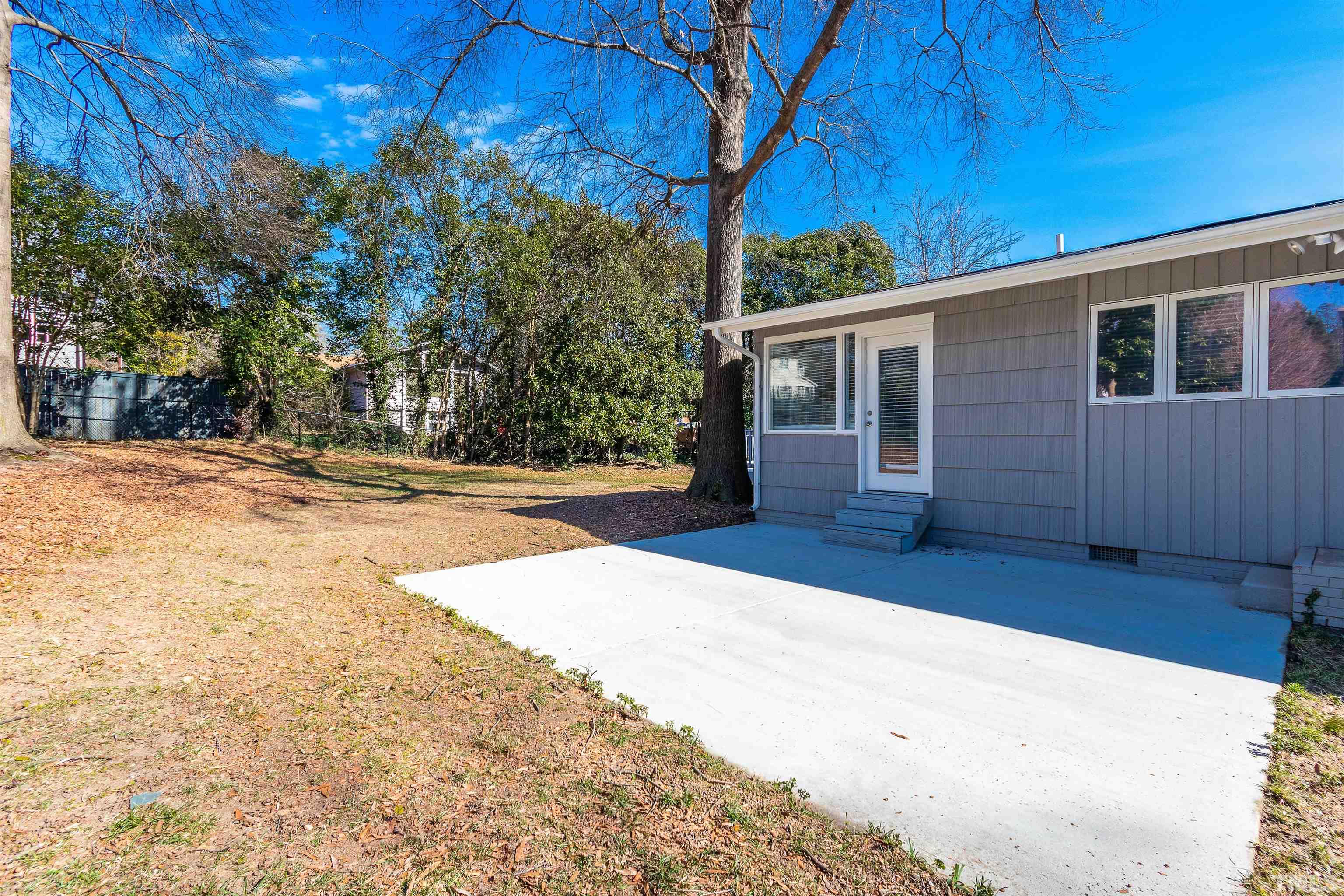 3412 Bradley Place Raleigh, NC 27607 - Photo 26 of 28 a view of backyard with a patio