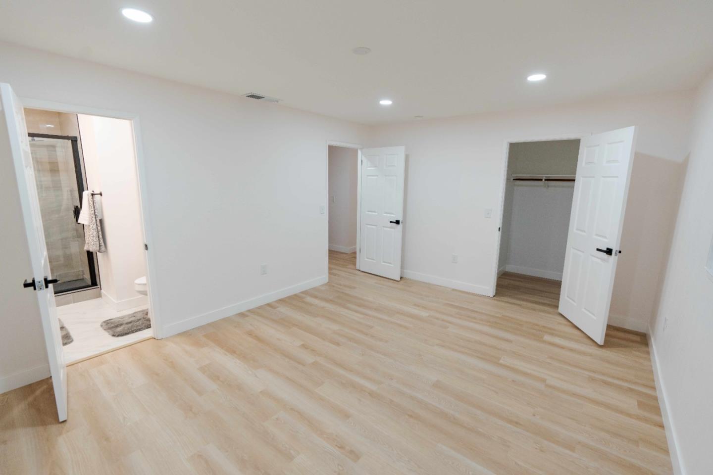 1429 Chadwick Place Manteca, CA 95336 - Photo 21 of 26 a view of empty room with wooden floor