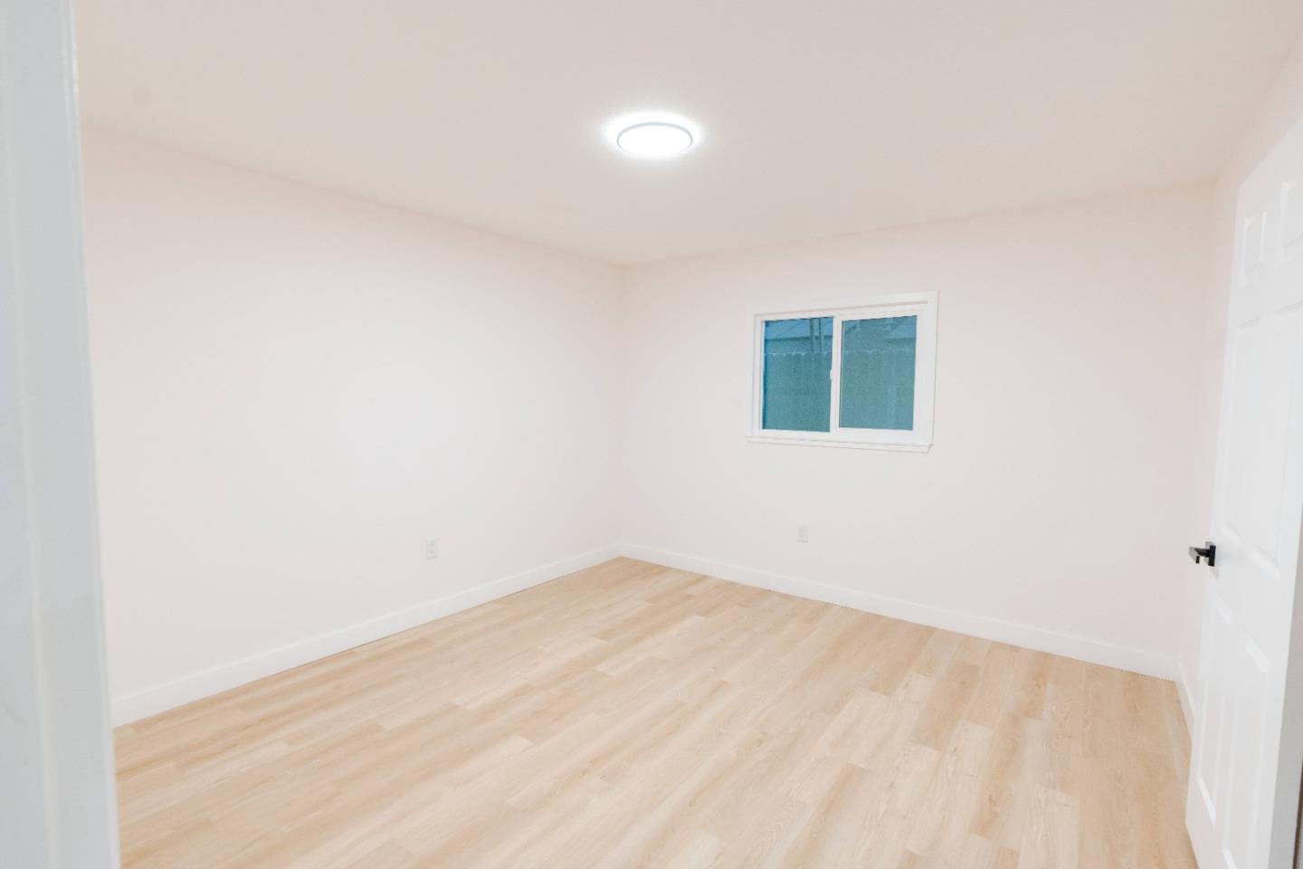 1429 Chadwick Place Manteca, CA 95336 - Photo 23 of 26 a view of a room with a window