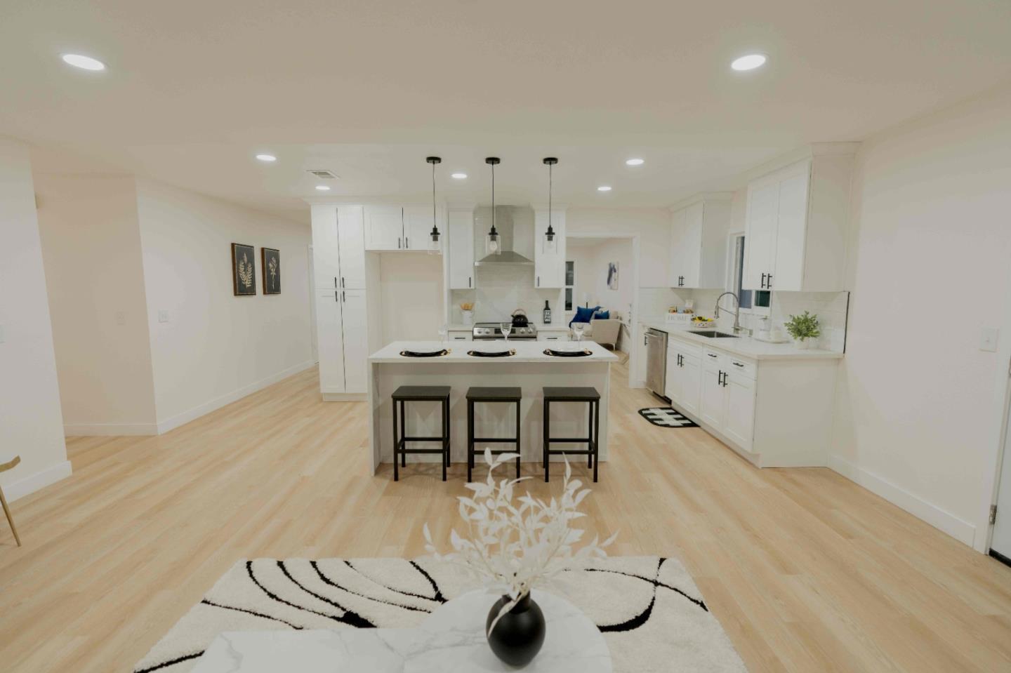 1429 Chadwick Place Manteca, CA 95336 - Photo 7 of 26 a kitchen with stainless steel appliances granite countertop a sink and cabinets