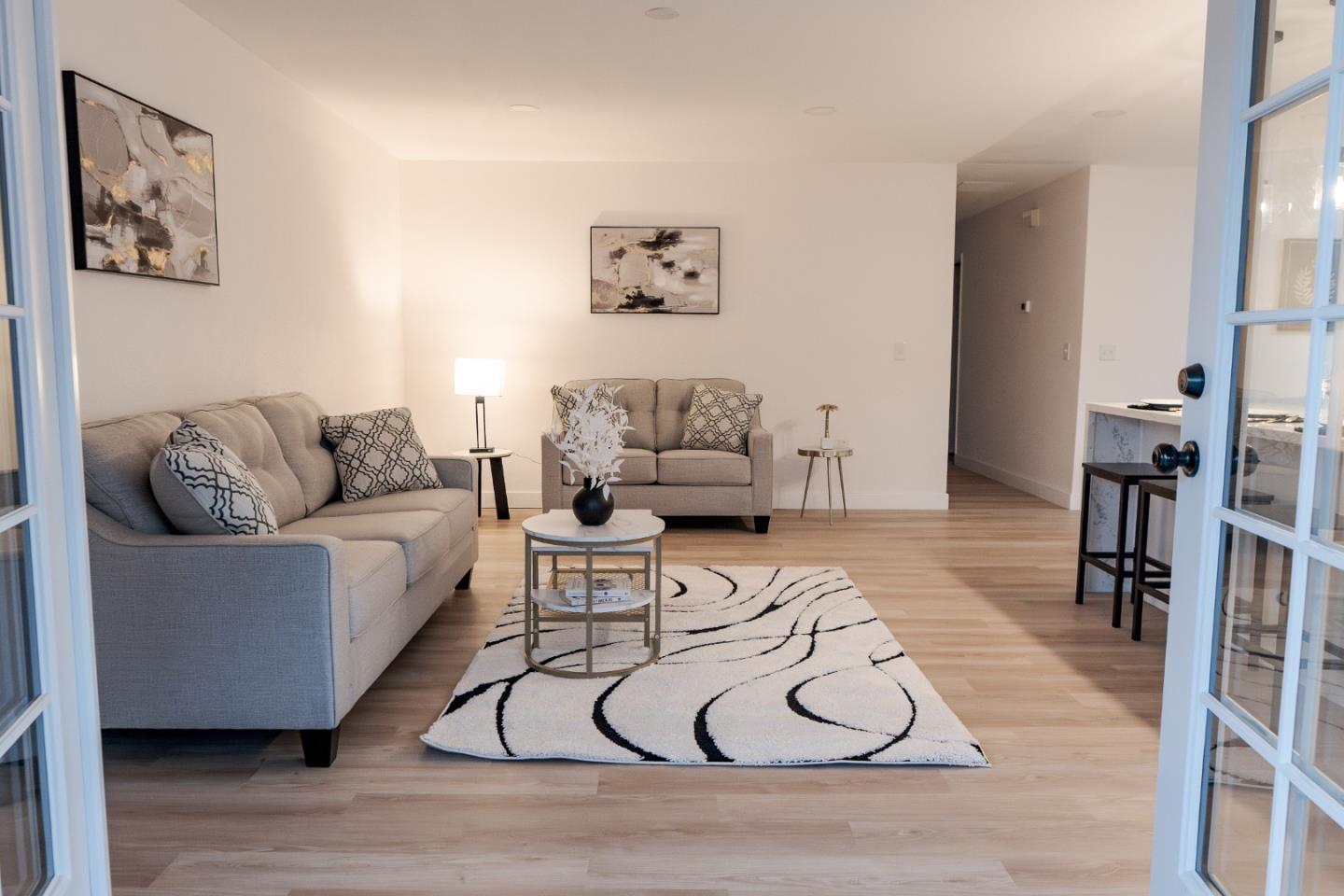 1429 Chadwick Place Manteca, CA 95336 - Photo 8 of 26 a living room with furniture and white walls