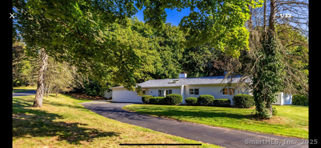 281 Spring Street Cheshire, CT 06410 - Photo 9 of 10 a front view of a house with a yard and trees