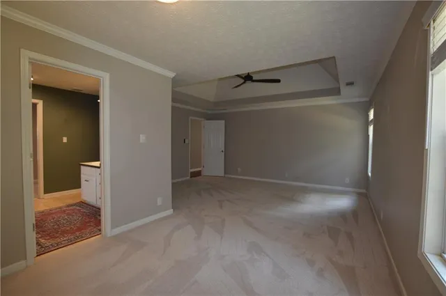 a bathroom with a tub and shower