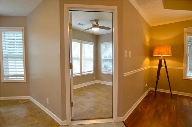 a view of an empty room with a window