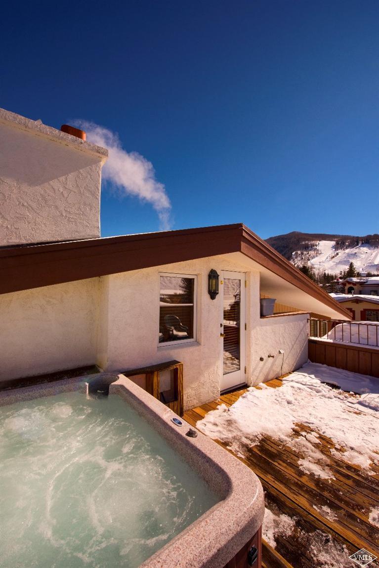 304 Bridge Street, Unit 3 Vail, CO 81657 - Photo 9 of 11 a view of an outdoor space and kitchen