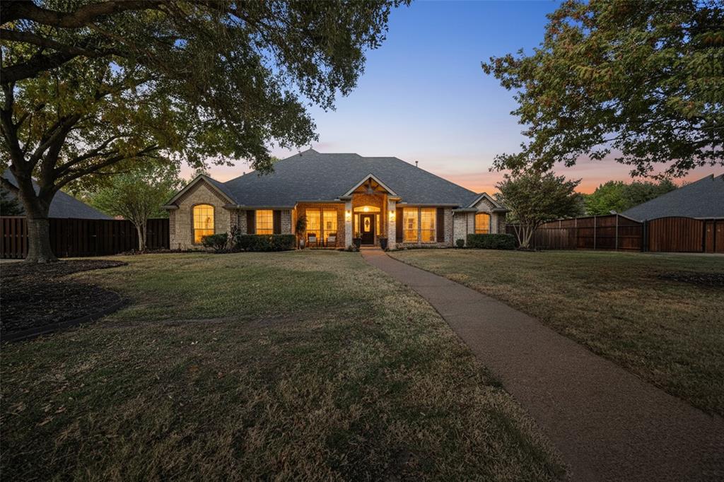 212 Ashmore Place Haslet, TX 76052 - Photo 2 of 39 View of front of house featuring stone siding and a gate