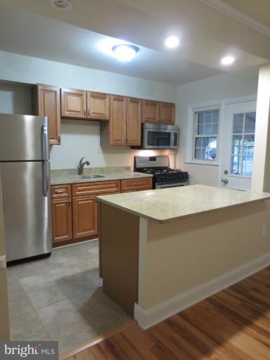 5906 Falkirk Road Baltimore, MD 21239 - Photo 4 of 18 New Ceramic Floor