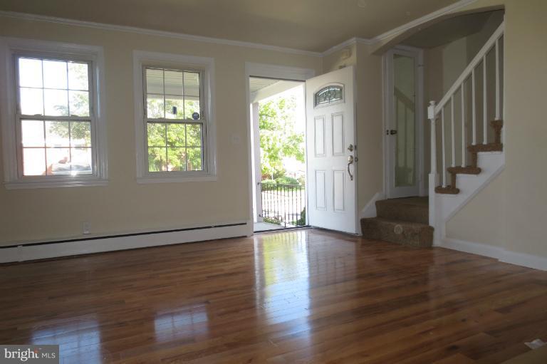 5906 Falkirk Road Baltimore, MD 21239 - Photo 9 of 18 New Hardwood Floor