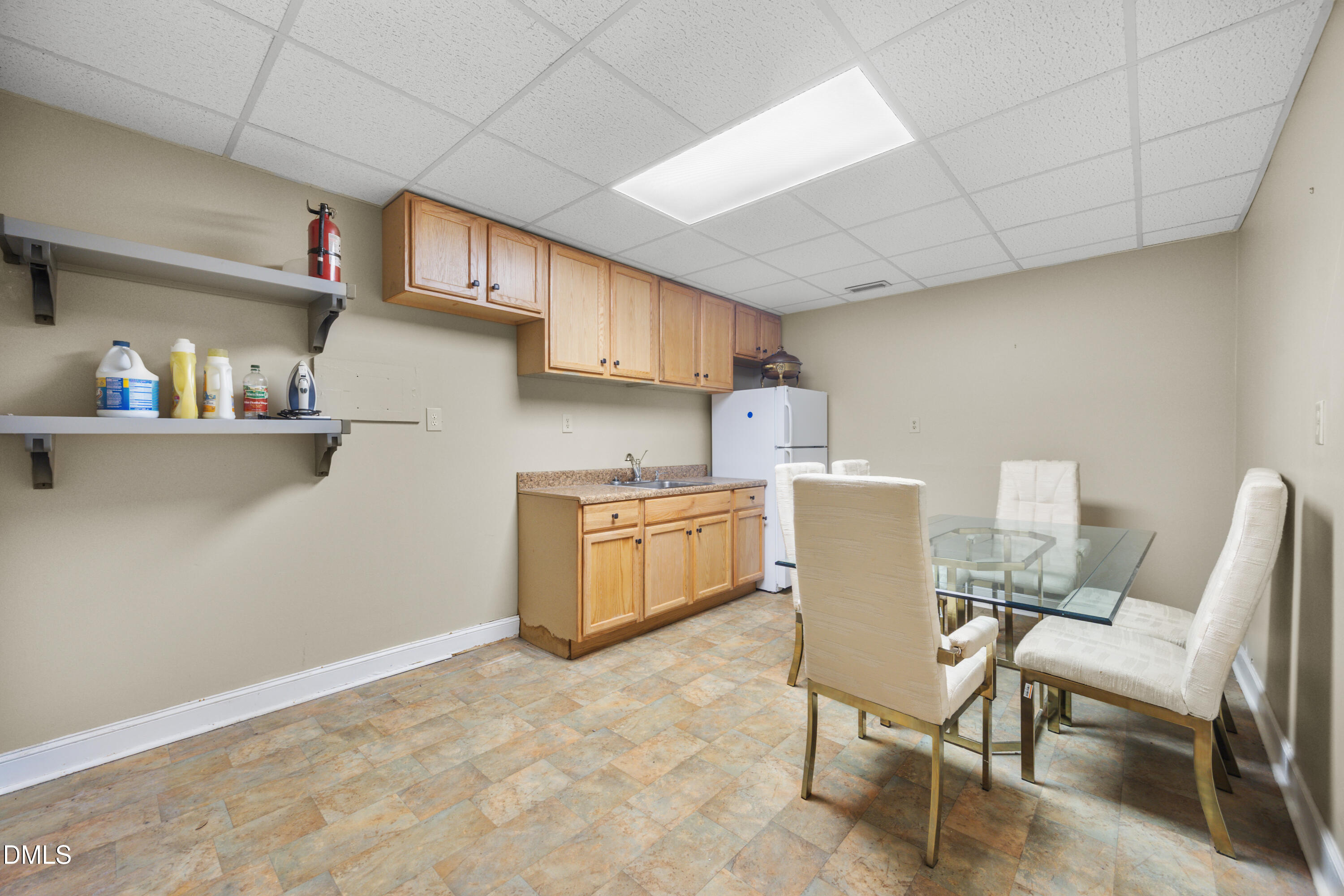 5012 Rock Quarry Road Raleigh, NC 27610 - Photo 42 of 63 Lower Level Kitchenette and Laundry