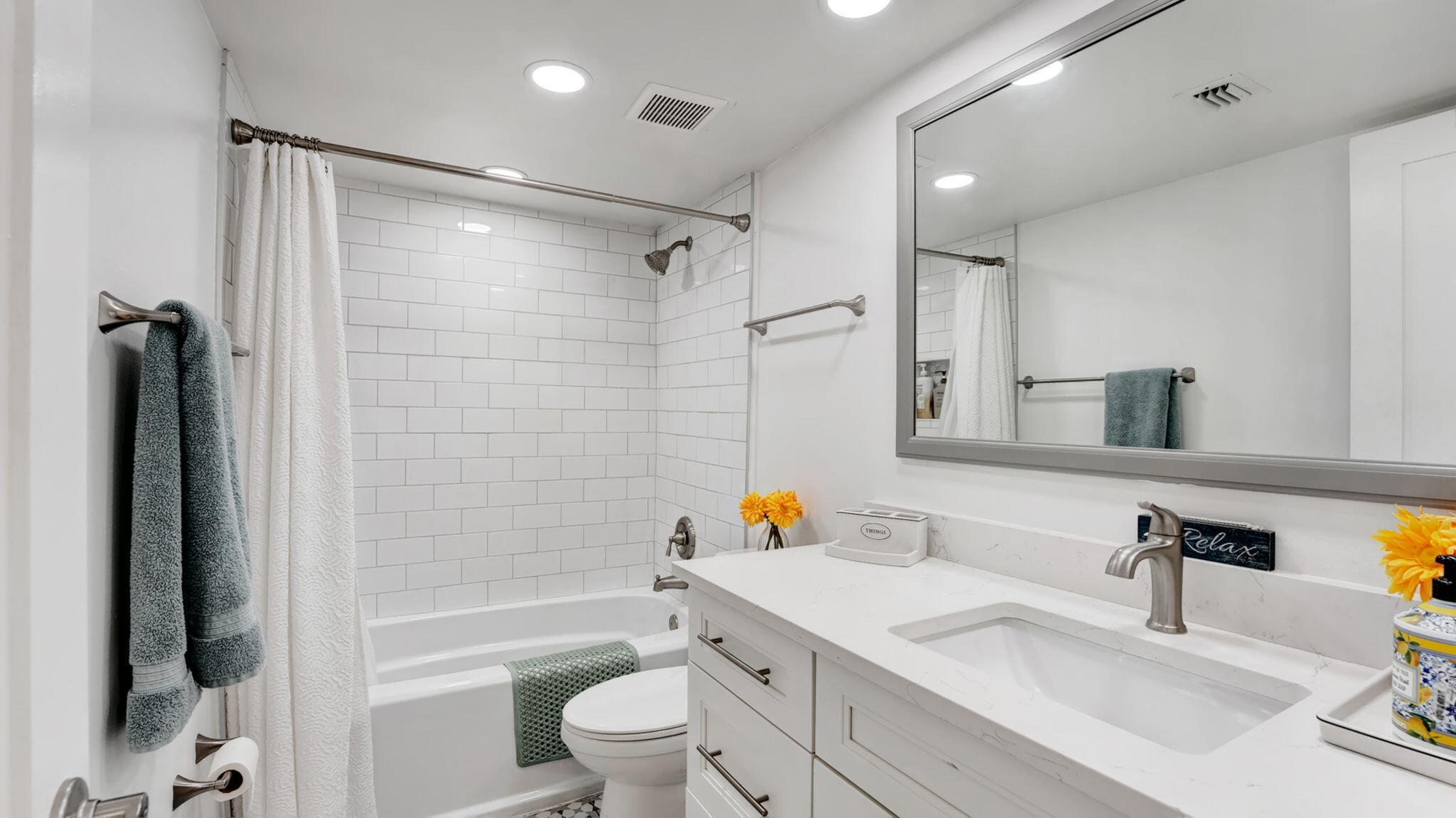 955 Dotterel Road, Unit 2103 Delray Beach, FL 33444 - Photo 13 of 23 a bathroom with a sink toilet tub and shower