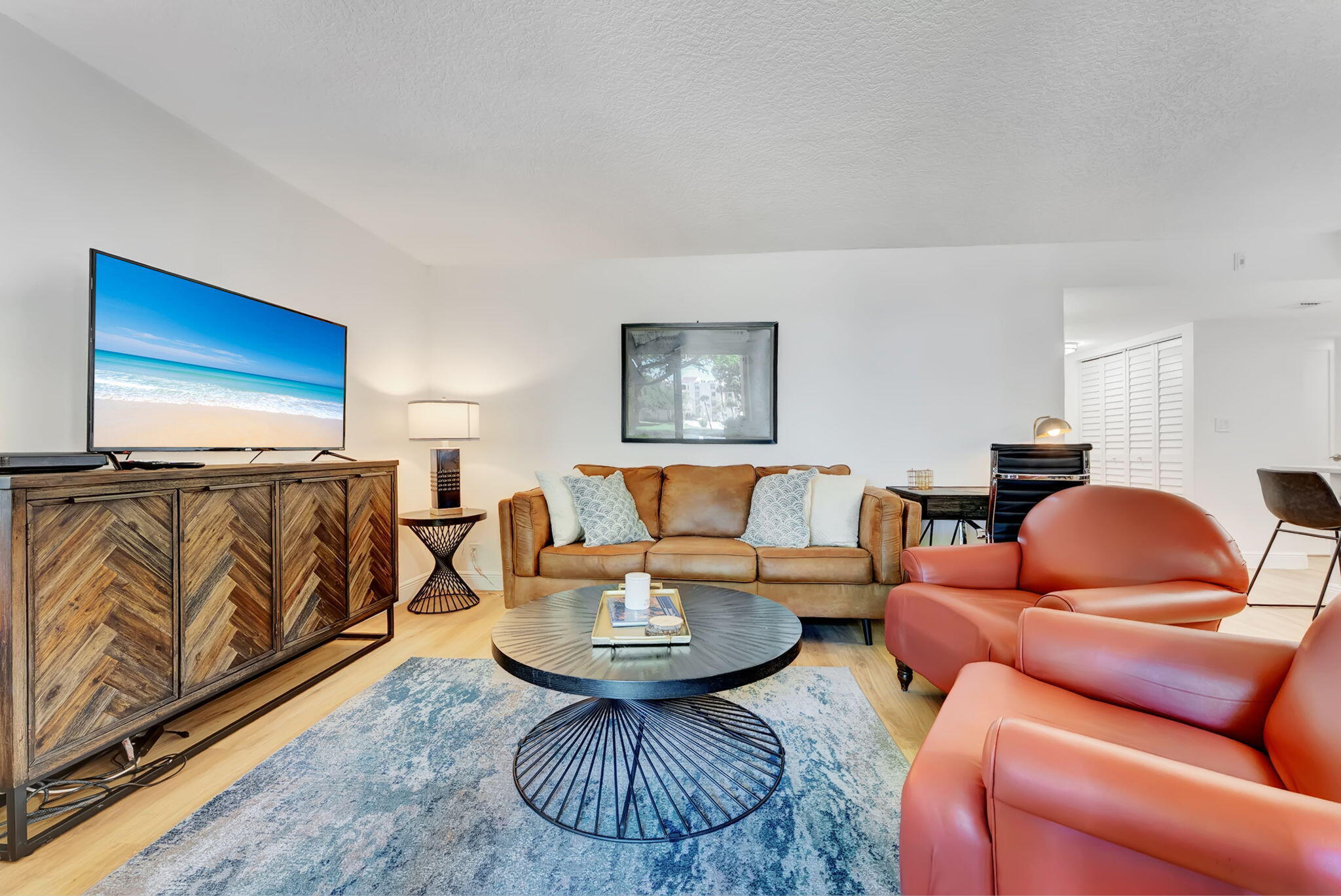 955 Dotterel Road, Unit 2103 Delray Beach, FL 33444 - Photo 6 of 23 a living room with furniture a rug and a window