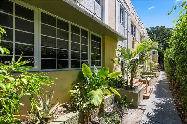a plant is in front of a building