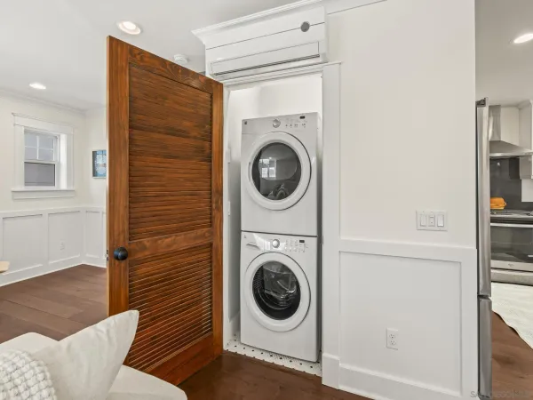 a utility room with dryer and washer