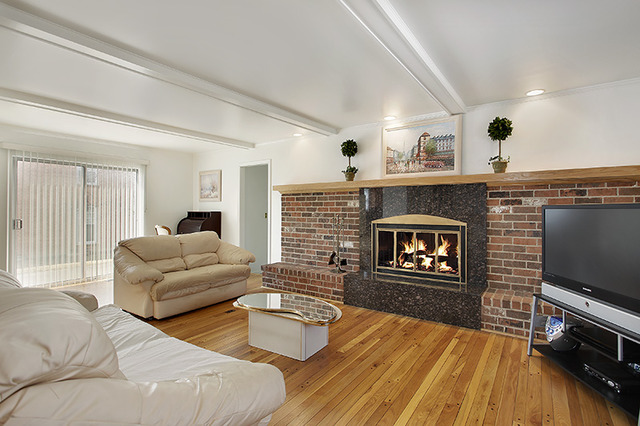 300 Lee Road Northbrook, IL 60062 - Photo 3 of 19 a living room with furniture flat screen tv and a fireplace