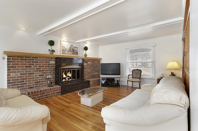 300 Lee Road Northbrook, IL 60062 - Photo 4 of 19 a living room with furniture flat screen tv and a fireplace