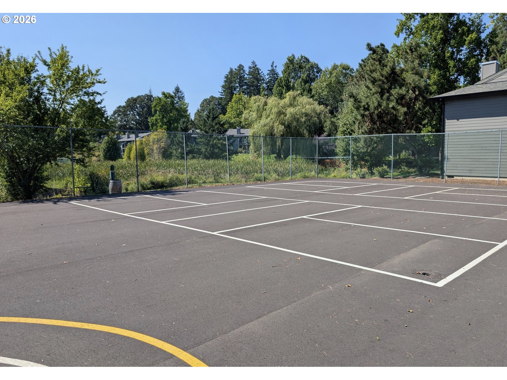 12628 Northwest Barnes Road, Unit 6 Portland, OR 97229 - Photo 13 of 13 a view of a tennis court