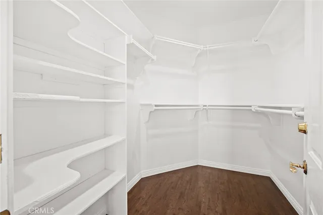 a view of a patio with a table and chairs