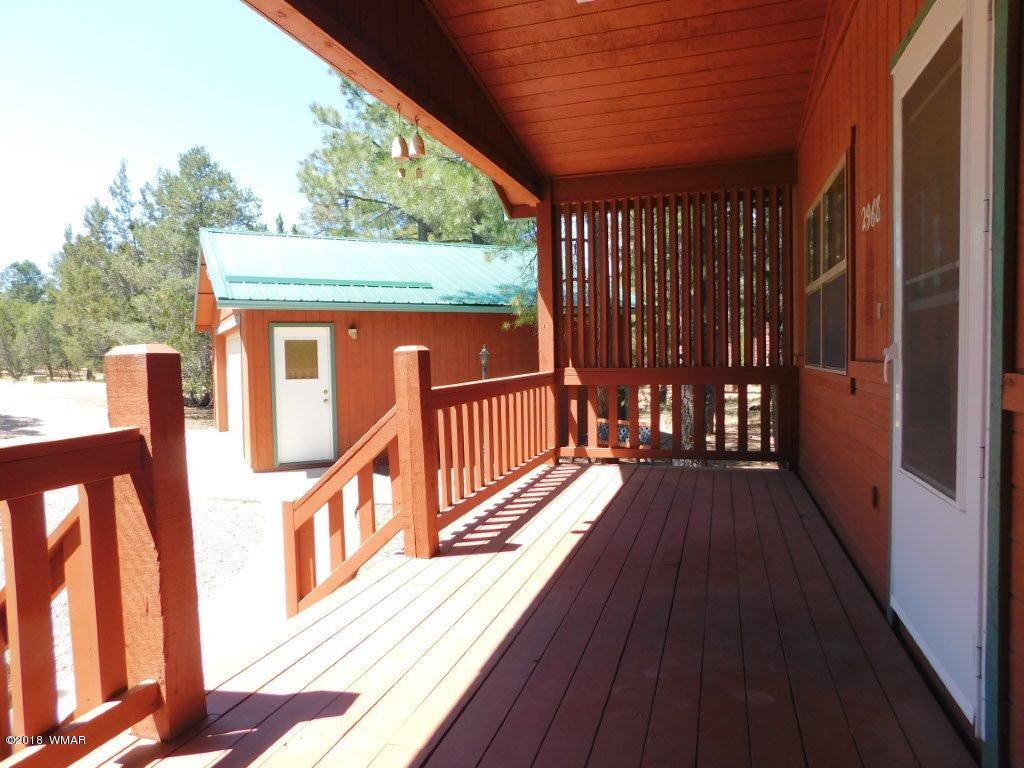 2968 Monica Road Overgaard, AZ 85933 - Photo 12 of 29 a view of balcony with wooden floor