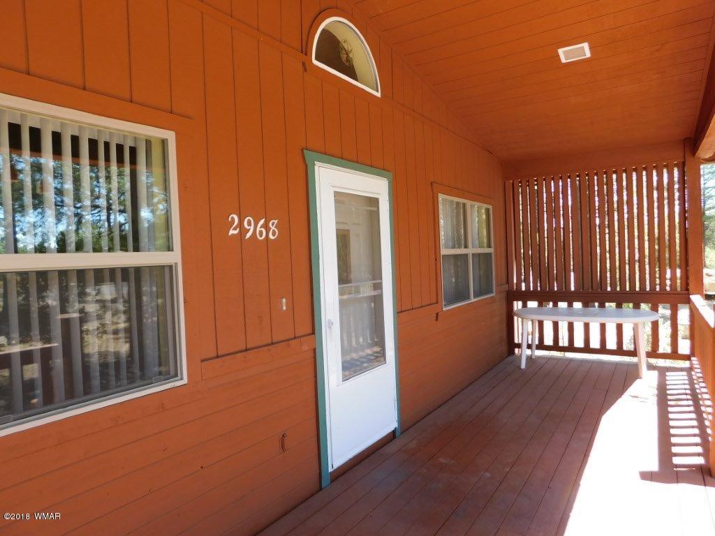2968 Monica Road Overgaard, AZ 85933 - Photo 13 of 29 a view of a balcony with wooden floor