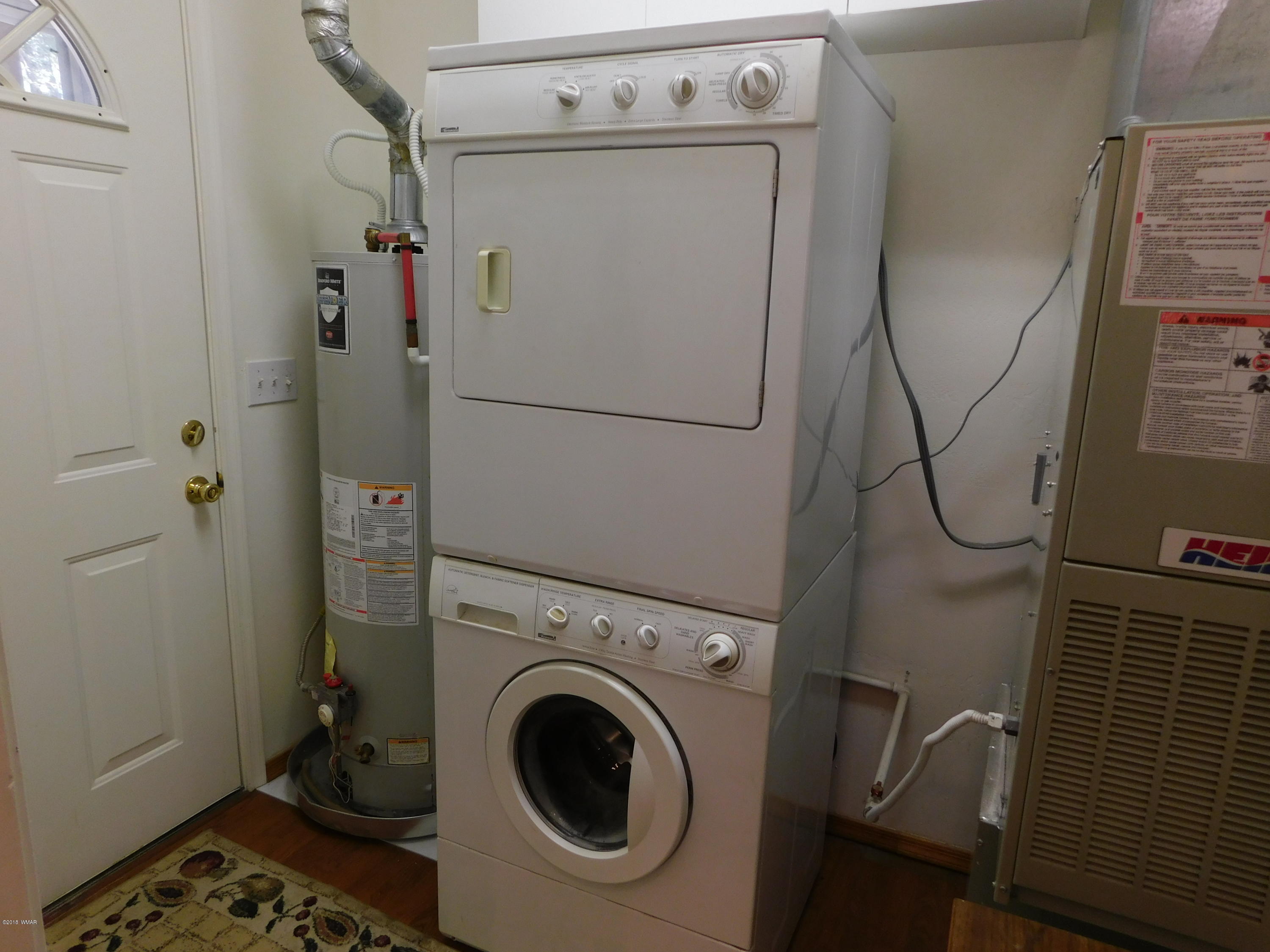 2968 Monica Road Overgaard, AZ 85933 - Photo 21 of 29 a utility room with dryer and washer