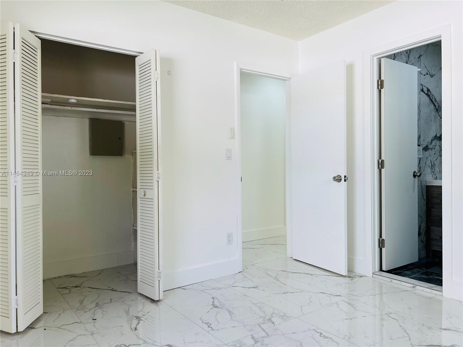 11301 Southwest 203rd Terrace Miami, FL 33189 - Photo 24 of 51 a view of an empty room
