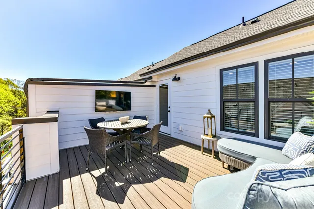 a view of a patio on the roof deck