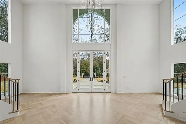 a view of entryway livingroom and hall