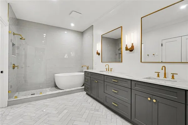 a bathroom with a sink and mirror