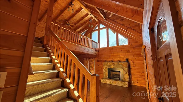 a view of an entryway with wooden floor